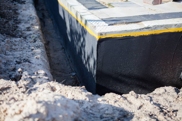 Professional Waterproofing technician working in Hampton, MN
